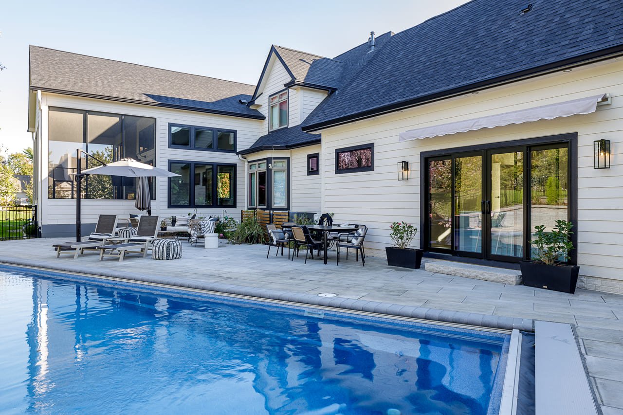 Custom Built Pool House Overlooking Backyard Pool Area | Compelling Homes Remodeling + Design