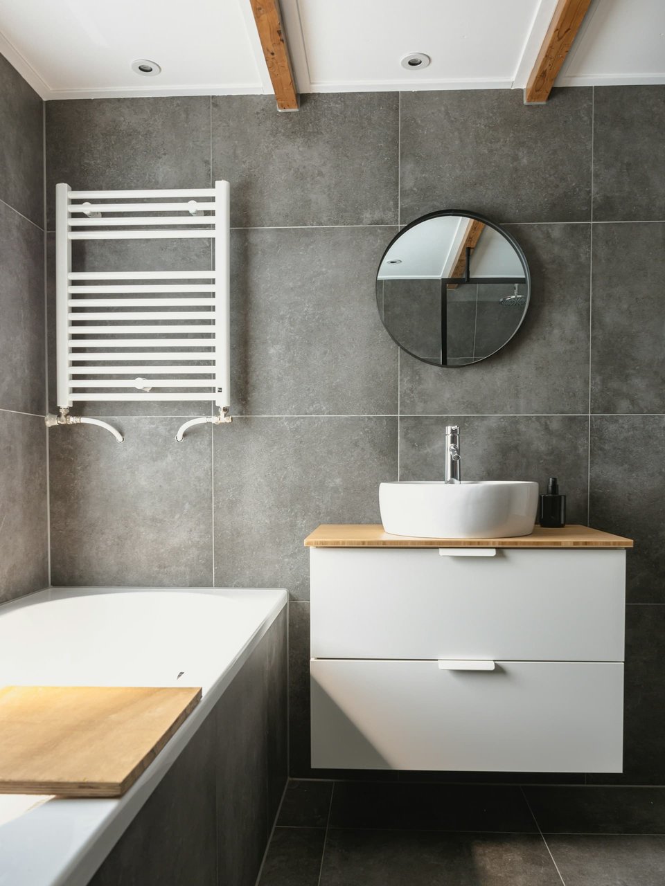 Pull Out Cabinets Installed Next To a Bathtub - Spare Bathroom Remodeling Ideas  | Compelling Homes
