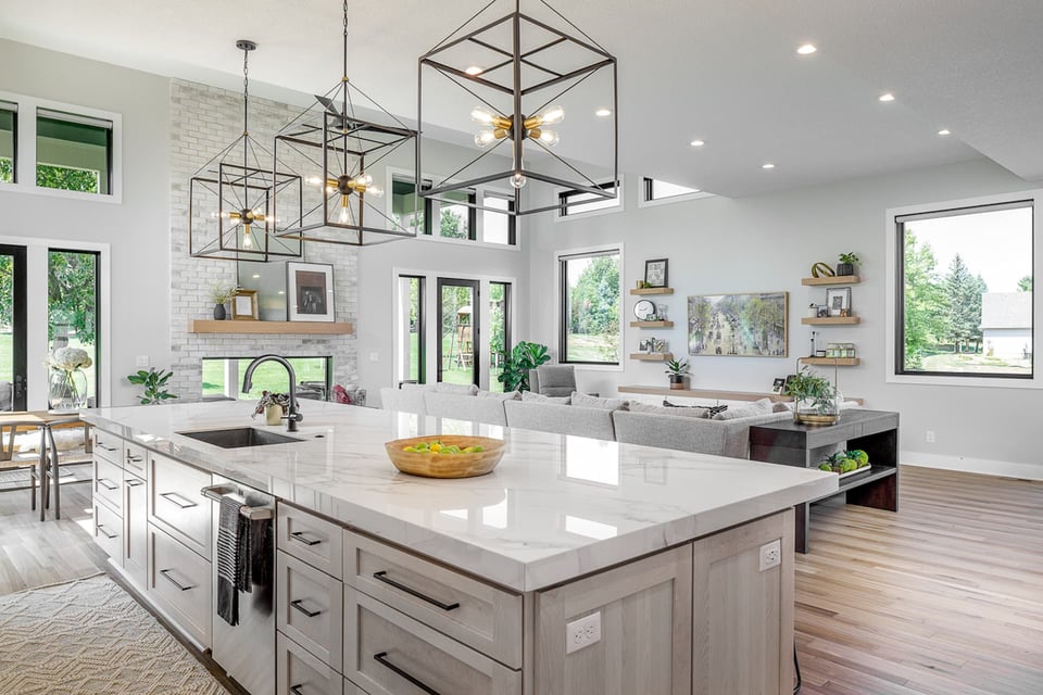 A kitchen featuring pendant lights, ceiling lights, and other light fixtures