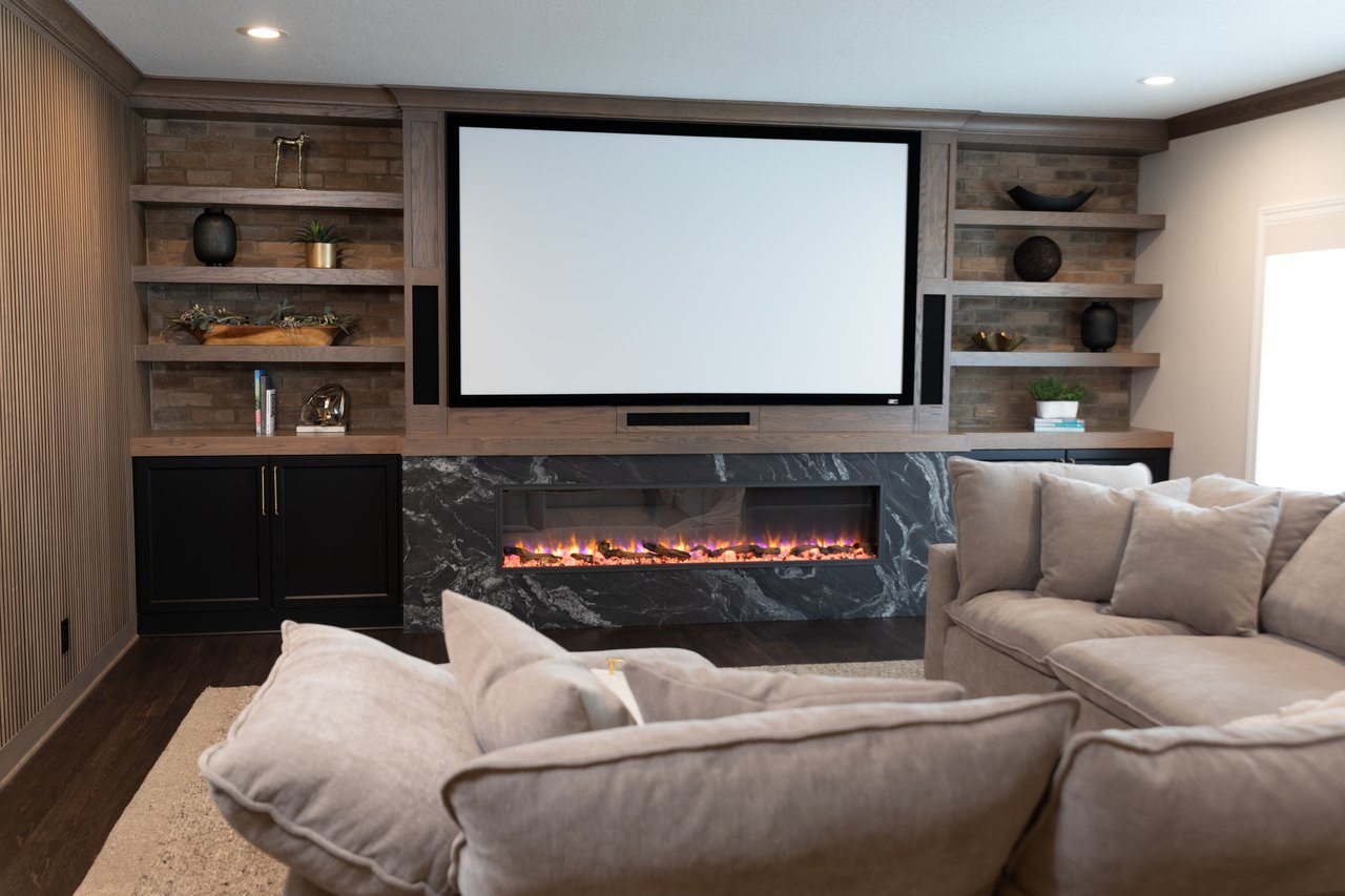 Home theater fitted into a basement sitting area