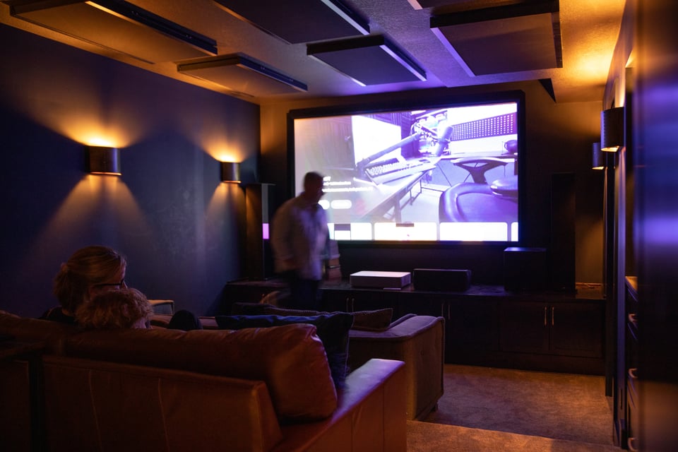 A full home theater in a basement optimized for maximum viewing