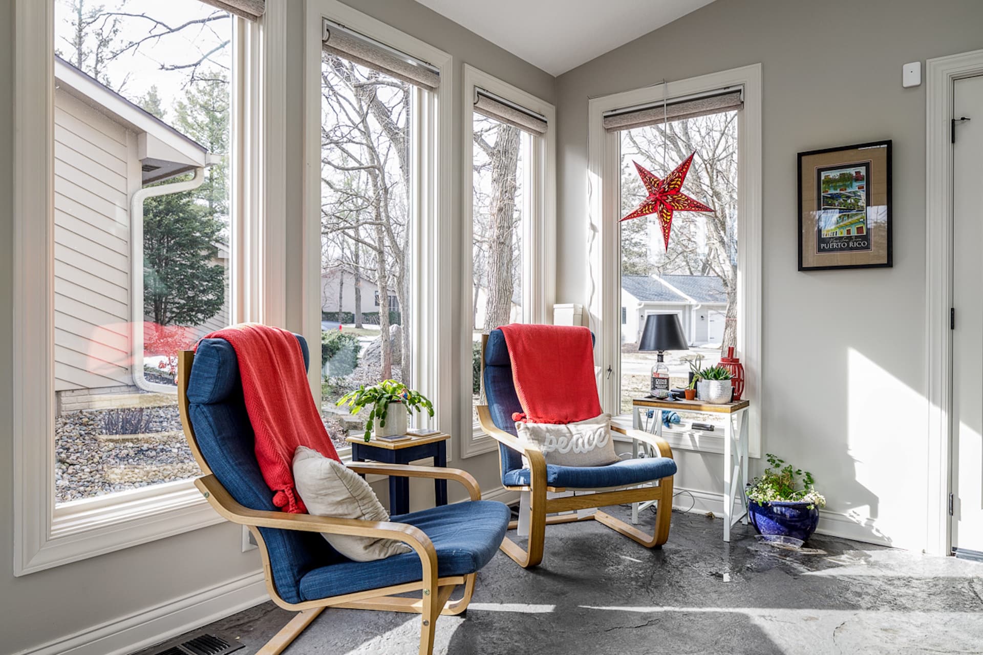 Two seats fitted into a sunroom