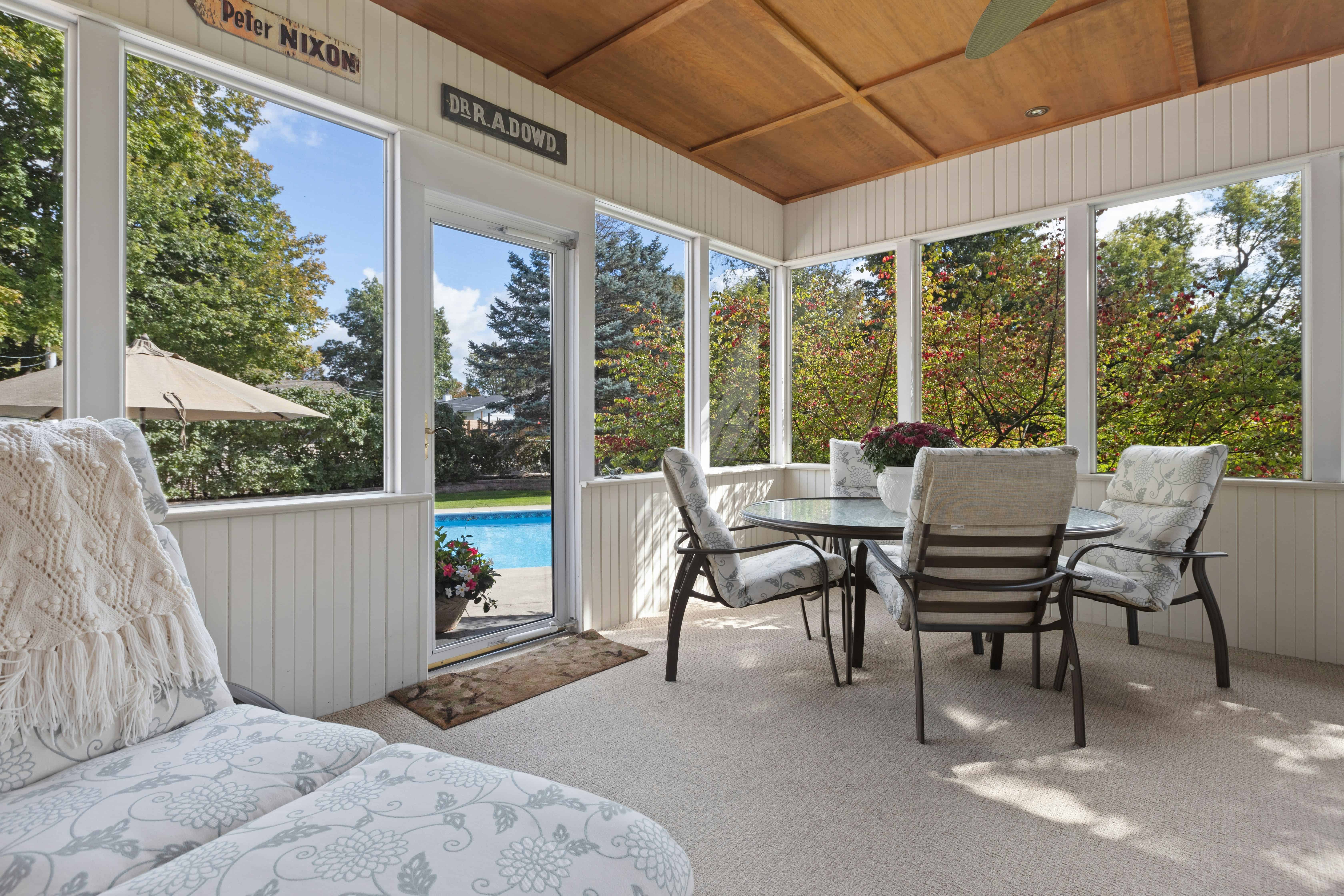 An enclosed sunroom built with wood