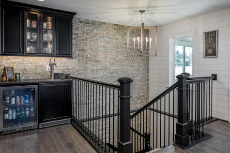 Whole Home Remodel with Stone Accent Wall and Walk-Up Bar and Shiplap Wall | Compelling Homes