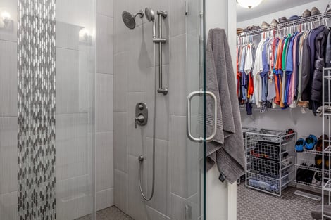 Bathroom Remodel Walk-In Glass and Tile Shower Entering into Walk-In Closet