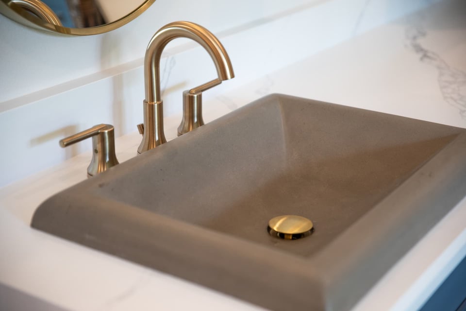 Concrete Sink With Gold Hardware 