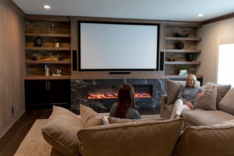 Guest Discussing In A Basement Home Theater