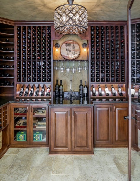In-Home Wine Cellar and Wine Tasting Area in Walk Out Basement Remodel | Compelling Homes Des Moines, IA