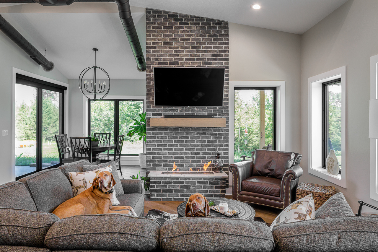 A living room with indoor fire pits added