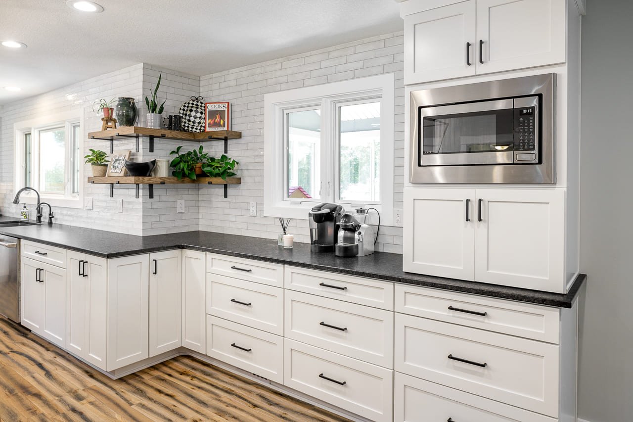 Countertops in Modern Farmhouse Kitchen Featuring Unique Corner Floating Shelves | Compelling Homes