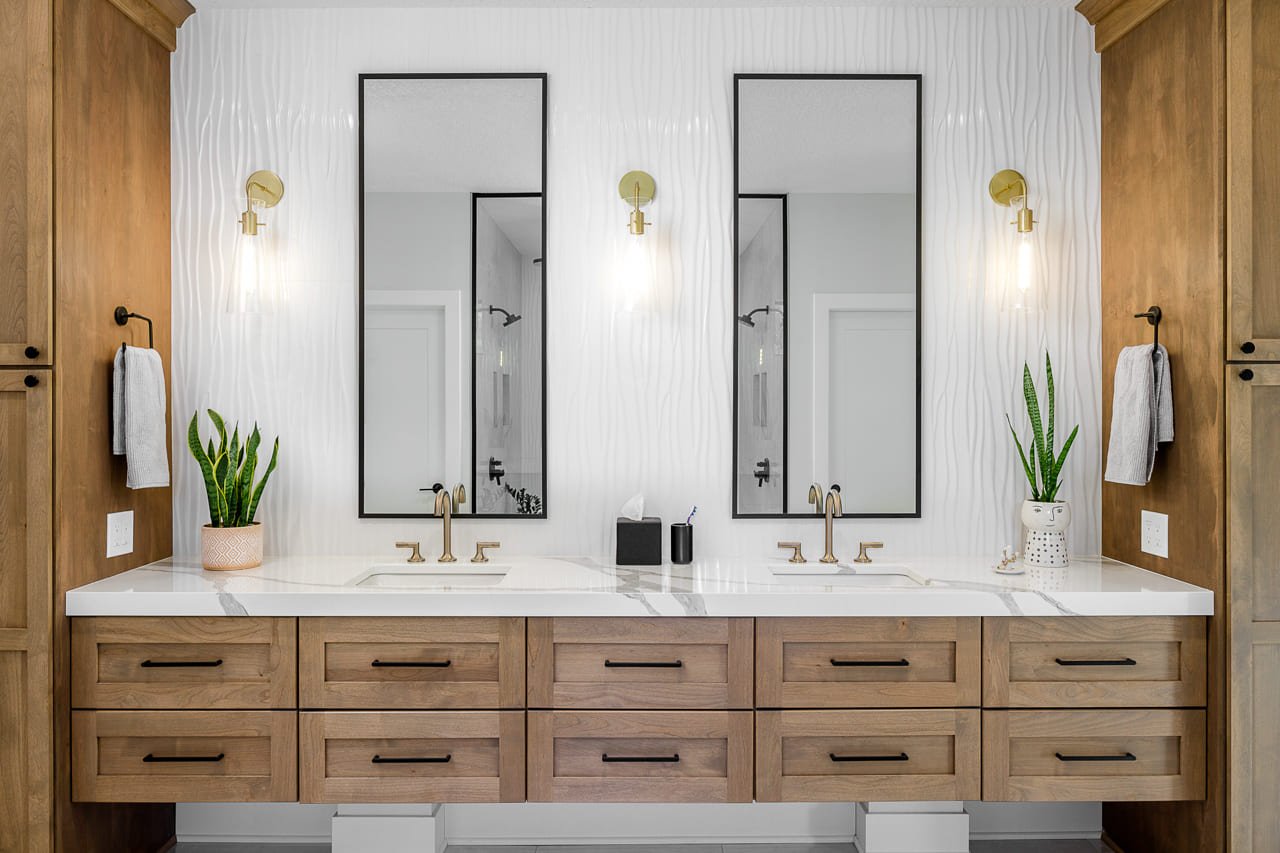 Oasis Bathroom featuring Textured Backsplash and His and Her Sinks | Compelling Homes Remodeling + Design