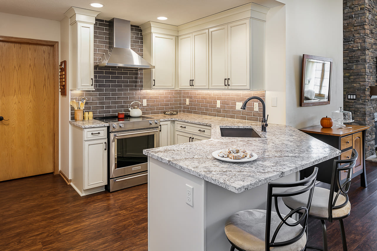 Kitchen remodel with vertical backsplash and breakfast nook