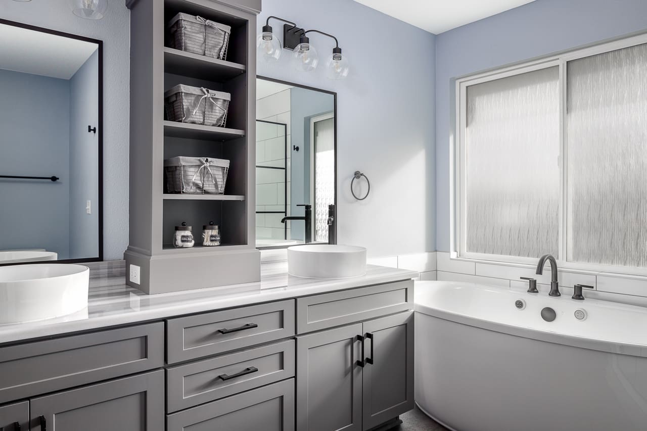 Relaxing bathroom with custom cabinetry