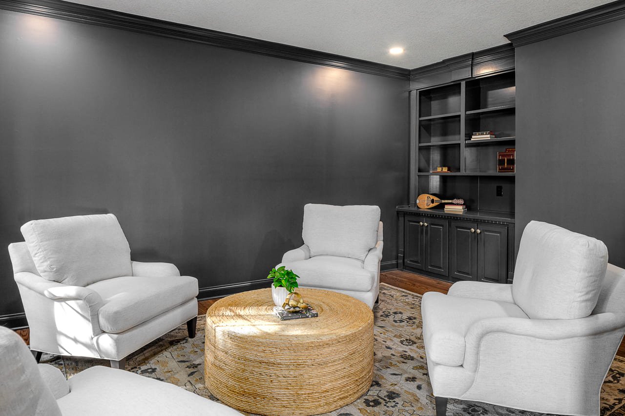 Full Black Wall Living Room with Modern Furniture | Compelling Homes